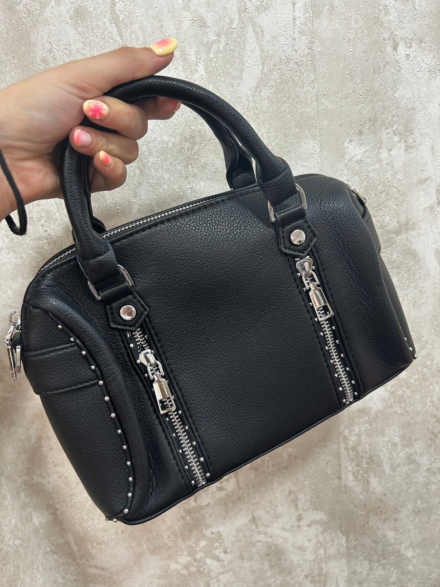 Bolso tachuelas